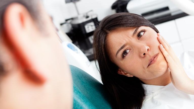 Woman In Pain | Scott J Stephens, DDS